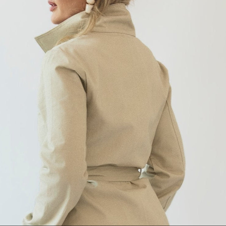 Back of the Capsule Original Trench showing tailored shaping through the shoulders and waist