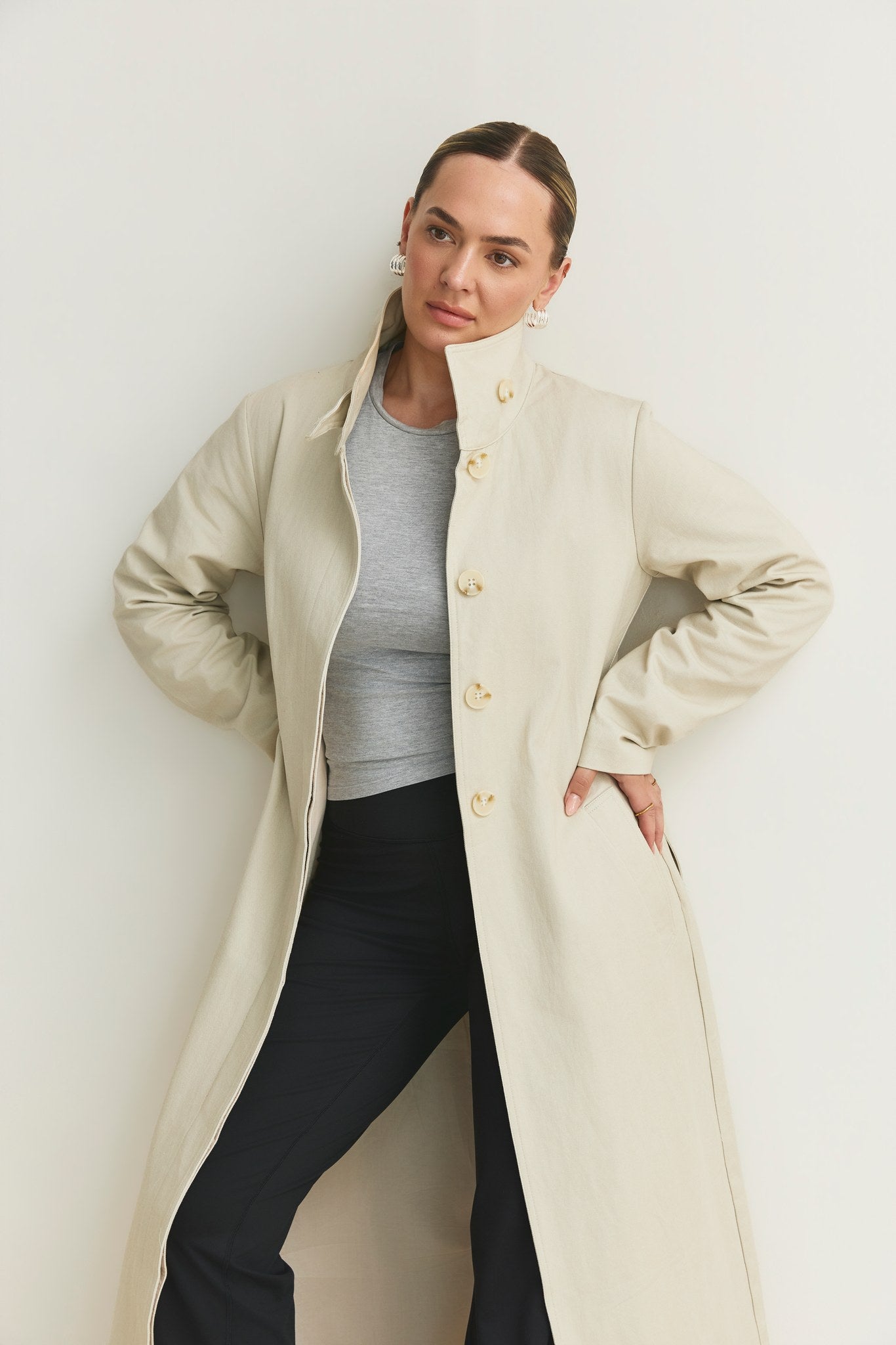 The Capsule Original Trench worn open, hands in pockets
